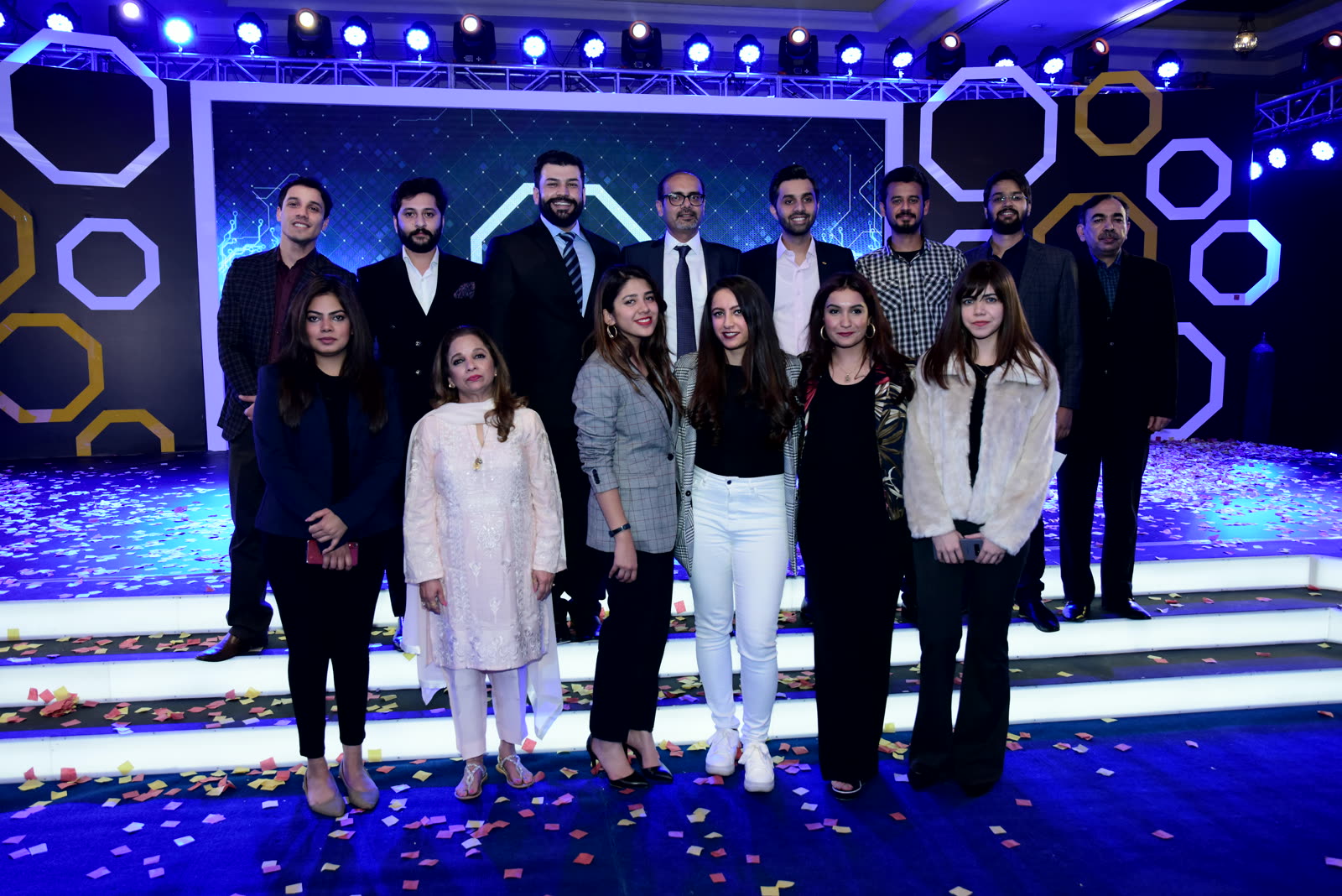 Group on stage at a corporate event in Pakistan